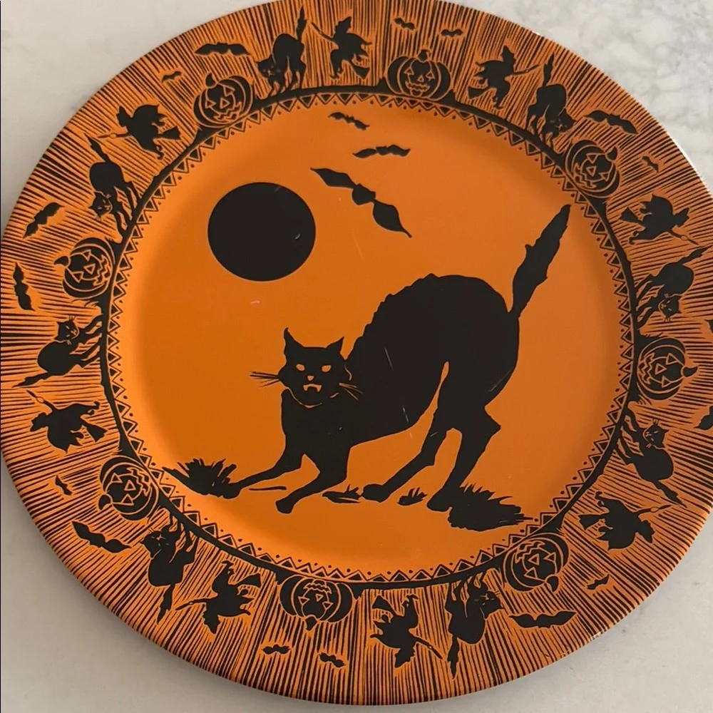 Set of Four Vintage Tin Halloween Themed Plates by restoration hardware